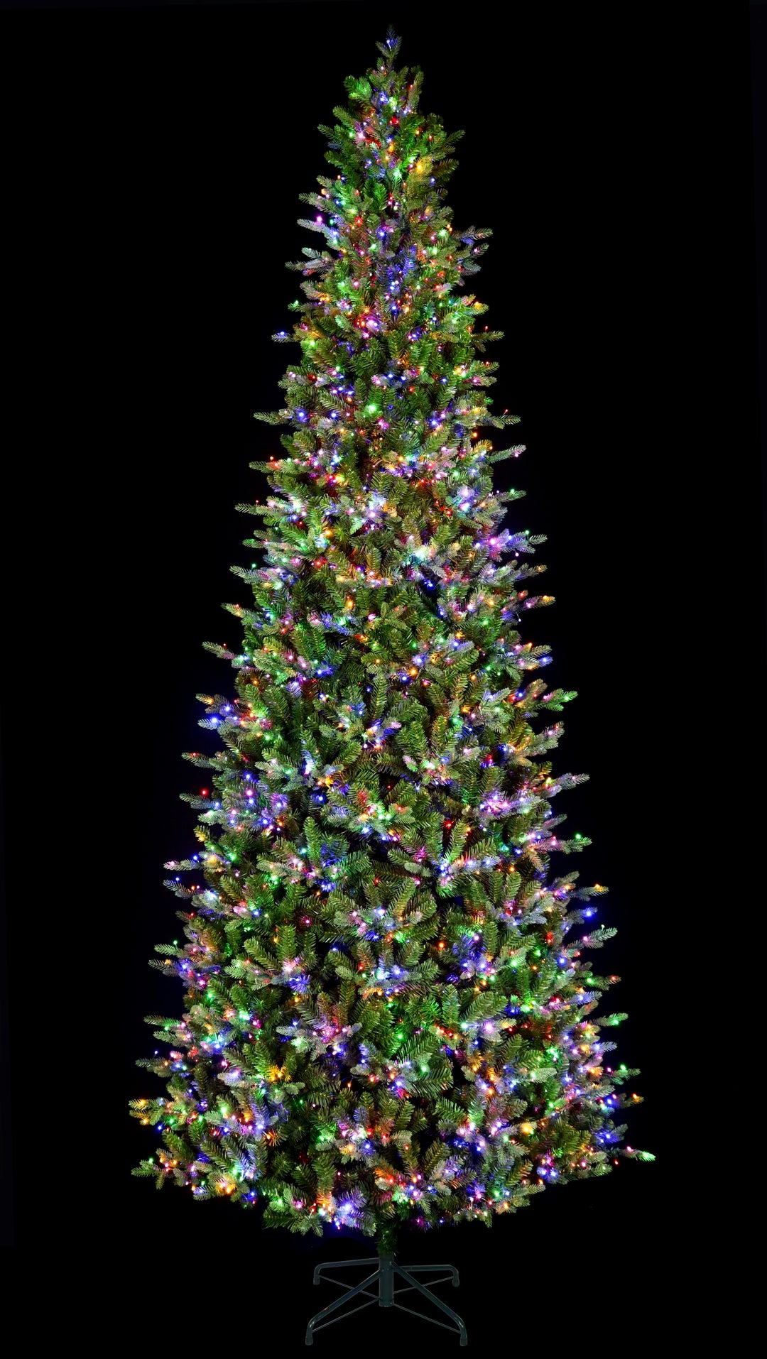 12' Alberta Slim Pre-Lit LED Artificial Christmas Tree, showing multi-colour lights on, black background.