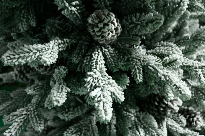 7.5' Woodland Flocked Pre-Lit LED Artificial Christmas Tree, close-up of foliage.