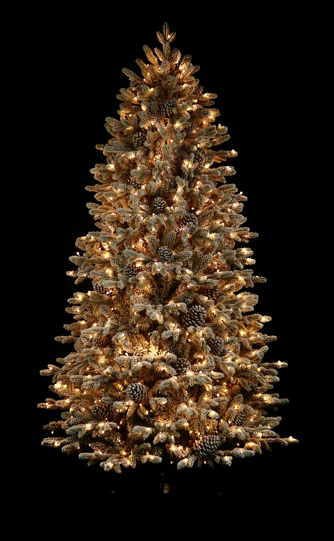 7.5' Woodland Flocked Pre-Lit LED Artificial Christmas Tree, showing warm white lights.