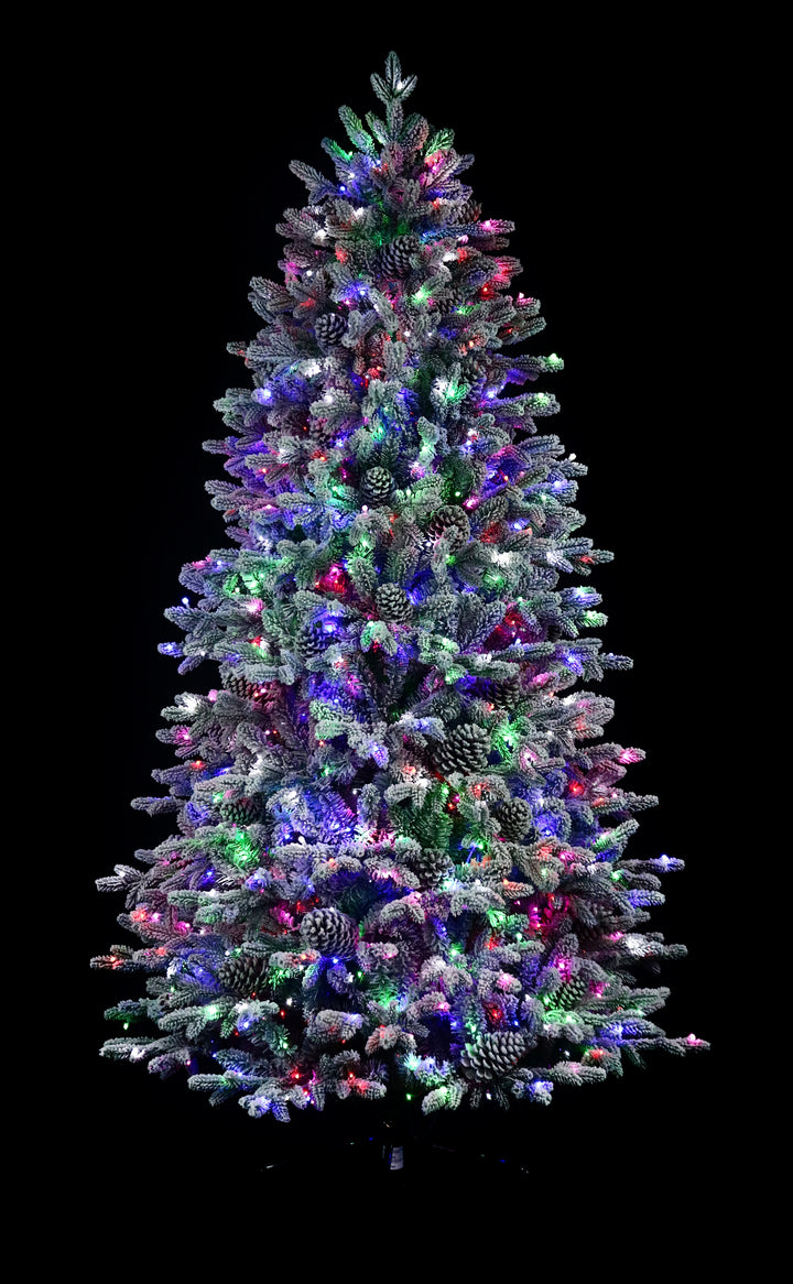 7.5' Woodland Flocked Pre-Lit LED Artificial Christmas Tree, showing multi-colour lights.