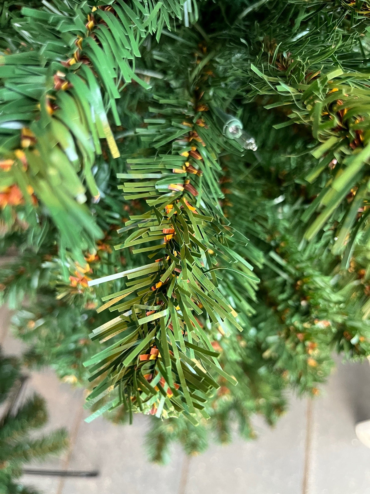 7.5' Tower Pre-Lit Artificial Christmas Tree, close-up of foliage.