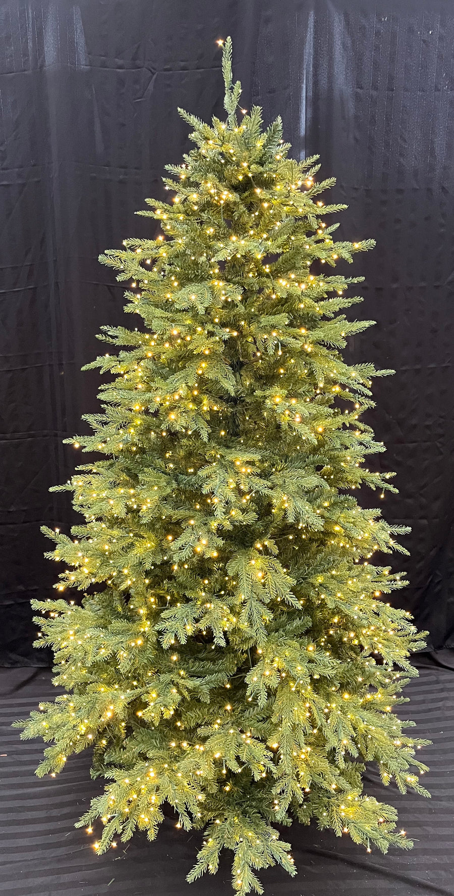 7.5' Kensington Pre-Lit LED Artificial Christmas Tree, showing clear lights.